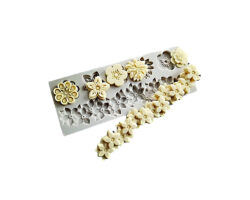 MOLDE SIL. GUIRNALDA Y FLORES 6 CAV. 14X5.5X0.7 CMS.