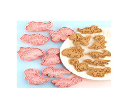 CORTADOR MARC. DINOS  8 CAV. APROX.7X5 CMS.